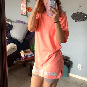 Future forward long neon pink short sleeve.